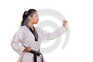 Karate girl ready to offense, side view profile on white background