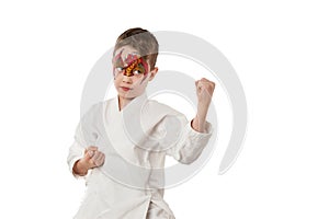 Karate kid with red gragon face painting