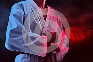 Karate martial arts fighter on dark background