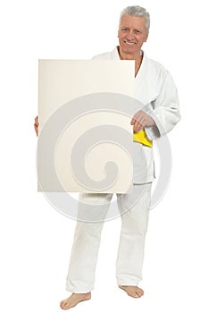 Karate Senior man with poster