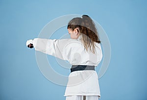 Karate sport concept. Self defence skills. Karate gives feeling of confidence. Strong and confident kid. She is