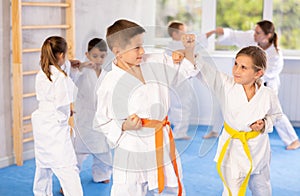 Karate students engage in sparring