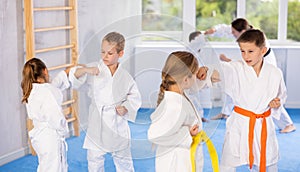 Karate students engage in sparring