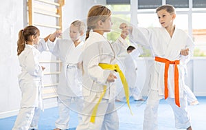 Karate students engage in sparring