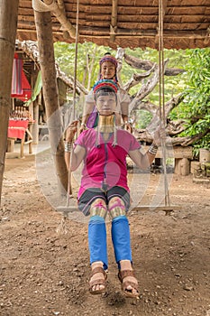 Karen women from Pai at Mae Hong Son, Thailand playing swing