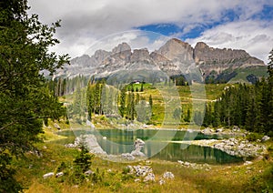 Karersee small alpine lake in Dolomites in South Tyrol, Italy