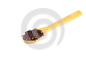 Karkade tea. Hibiscus tea leaves in wooden spoon isolated on white background. File contains clipping path. Top view