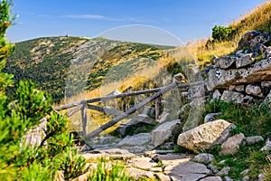Karkonosze Mountains, Western Sudetes, mountain hiking trail leading along the plain through the peaks, natural mountain landscape