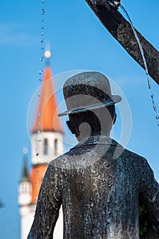 Karl Valentin Brunnen fountain at Viktualienmarkt market place, Munich, Germany photo