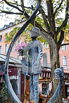 Karl Valentin Brunnen fountain at Viktualienmarkt market place, Munich, Germany photo