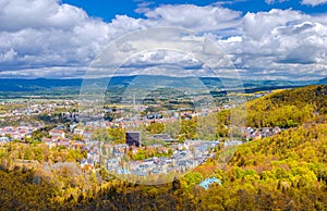 Karlovy Vary city aerial panoramic view with row of colorful multicolored buildings