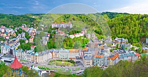 Karlovy Vary city aerial panoramic view with row of colorful multicolored buildings