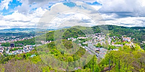 Karlovy Vary city aerial panoramic view with row of colorful multicolored buildings