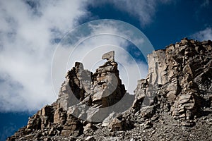 Karma axe in Kailas kora Himalayas mountain Tibet sky and clouds