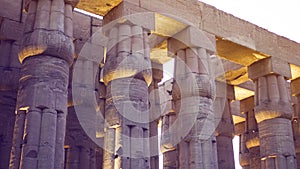 Karnak temple of Luxor architecture column detail close-up wiht uplight in evening