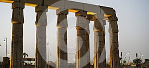 Karnak temple of Luxor architecture column detail close-up wiht uplight in evening