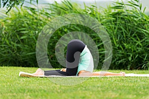 Karnapidasana Deaf Man's Yoga Pose