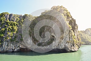 Karst landforms in the sea, the world natural heritage - halong bay in Vietnam at sunset