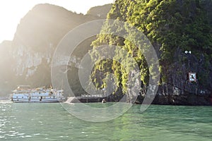 Karst landforms in the sea y Tourist junks in Halong bay in Vietnam, South Asia