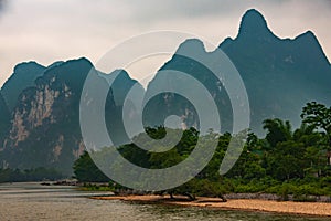 Karst mountain range with rounded tops along Li River in Guilin, China