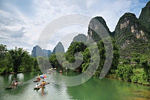 Karst mountains reflected in Yulong river