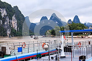 Karst peaks in Xingping Town and pleasure boat on the Li River