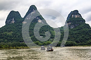 Karst peaks in Xingping Town and pleasure boat on the Li River