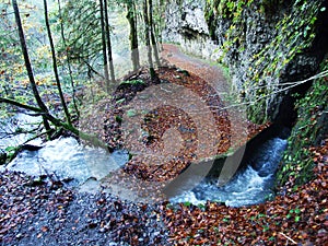 Karst spring Blaue Brunnen next to Lake Klontalersee in the valley of Klontal