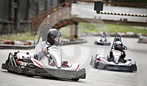 Karting. motorsport road racing with open-wheel four wheeled vehicles at go-karts