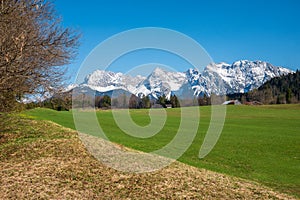 Karwendel mountain range, view from Gerold, with green meadow