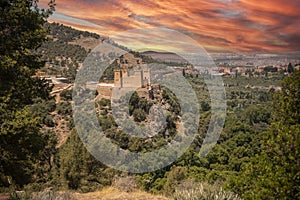 The Kasbah castle from the Middle Atlas and the Tadla plain of Morocco protecting and overlooking the Moroccan city of Beni Mellal photo