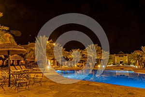 Kasbah-Hotel Chergui. Pool and garden of a maroccan kasbah hotel at night, Maroc, Africa