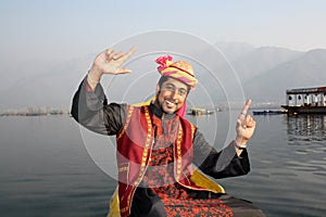 Kashmiri Boy Dancing to a Folk Song on a Shikara