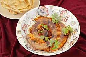 Kashmiri chicken and pappadums