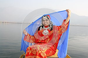 Kashmiri Girl Lifting her Blue Veil