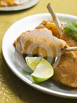 Kashmiri Lamb Cutlets with Lime Wedges photo