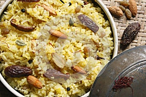 Kashmiri modur pulao is sweetened rice from India