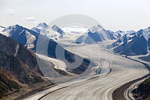 The Kaskawulsh Glacier flows between the mountains in Kluane National Park, Yukon, Canada