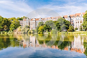 Kasprowicz Park in Szczecin. View of the surrounding historic tenement houses. landscape