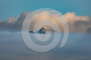 Kasprowy Wierch in the clouds on blue sky, Zakopane, Poland