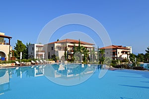 Kassandra, Halkidiki, Greece - September, 20 2013: Blue swimming pool in luxury Greek hotel Aegean Melathron Thalasso, Halkidiki,