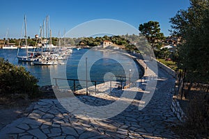 KASTOS island, GREECE-JULY, 2020. Port of Kastos island with moored yachts, sailboats - Ionian sea, Greece in summer.