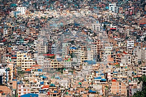 Kathmandu - the capital of Nepal bird eye view to the city center overloaded with poor quarters. Pollution, disorderly urban