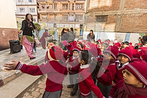 KATHMANDU, NEPAL - pupils during dance lesson in primary school
