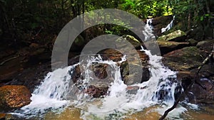 Kathu waterfall in a tropical forest. Phuket, Thailand