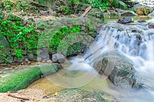 Kathu waterfall water gently flowing down the rocks Patong Phuket Thailand Asia