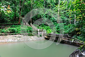 Kathu waterfall water gently flowing down the rocks Patong Phuket Thailand Asia