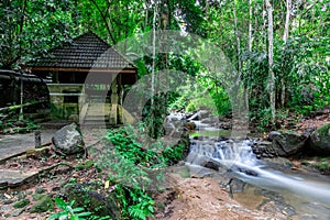 Kathu waterfall water gently flowing down the rocks Patong Phuket Thailand Asia