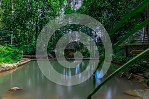 Kathu waterfall water gently flowing down the rocks Patong Phuket Thailand Asia