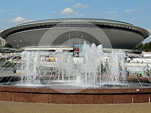 KATOWICE,SILESIA,POLAND-Fountain on central roundabout and sports hall Spodek
